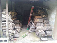 Wood shed from lumber from the property